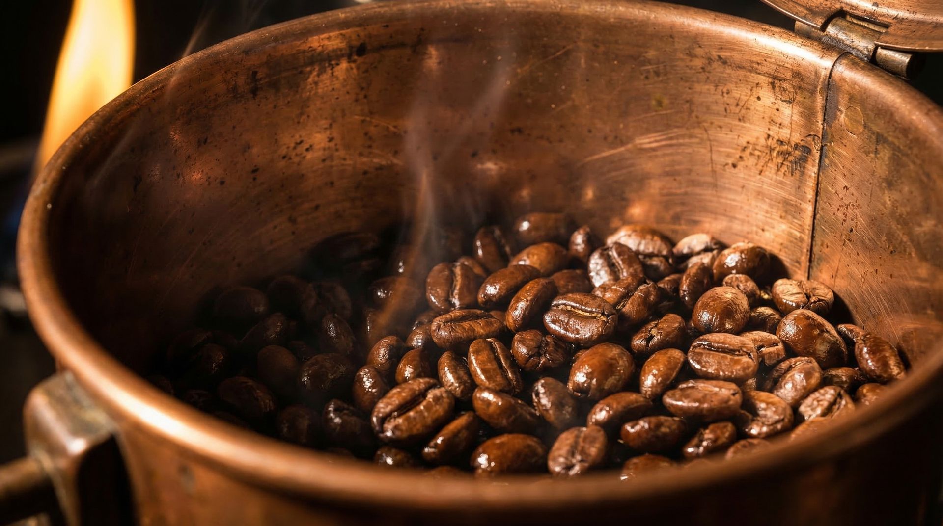 Closeup of roasted coffee beans with warm amber light